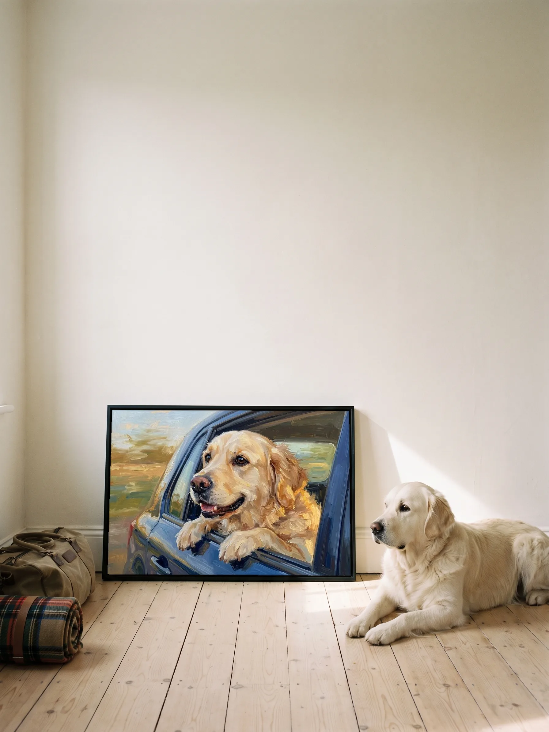 A golden retriever lying in profile beside its own oil painting: a canvas in a slim black frame leaning on a wall in the sun